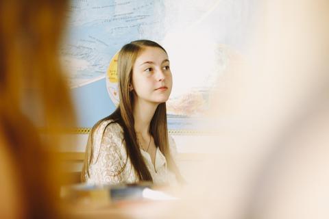 Student listening to lecture